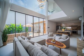 Deluxe Villa, Pool View | Living area | Smart TV - Zenithy 3BR Villa with Pool by NLA (Choeng Thale)