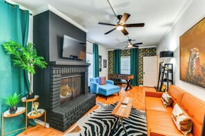 House (3 Bedrooms) | Living area | TV, fireplace - Colorful Baton Rouge Home: Deck, Grill & Fire Pit (Baton Rouge)