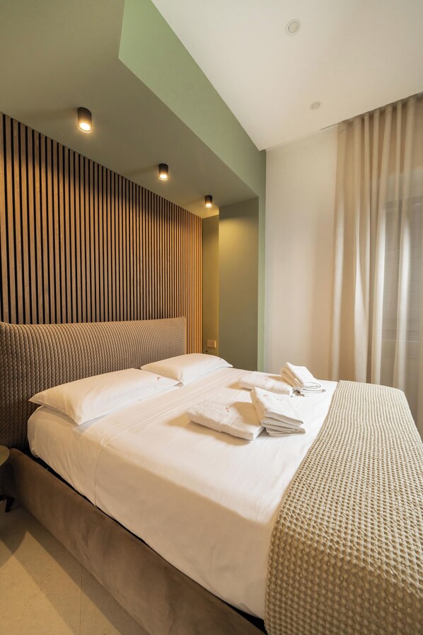 Superior tweepersoonskamer | Luxe beddengoed, bedden met traagschuimmatrassen, een kluis op de kamer