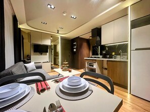 Standard Condo, Garden View | Living area | 32-inch LCD TV with satellite channels, heated floors - Grand Diker Port Residence (Konyaalti)