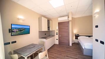 Classic Studio, Balcony, Partial Lake View | In-room safe, laptop workspace, blackout curtains, free WiFi