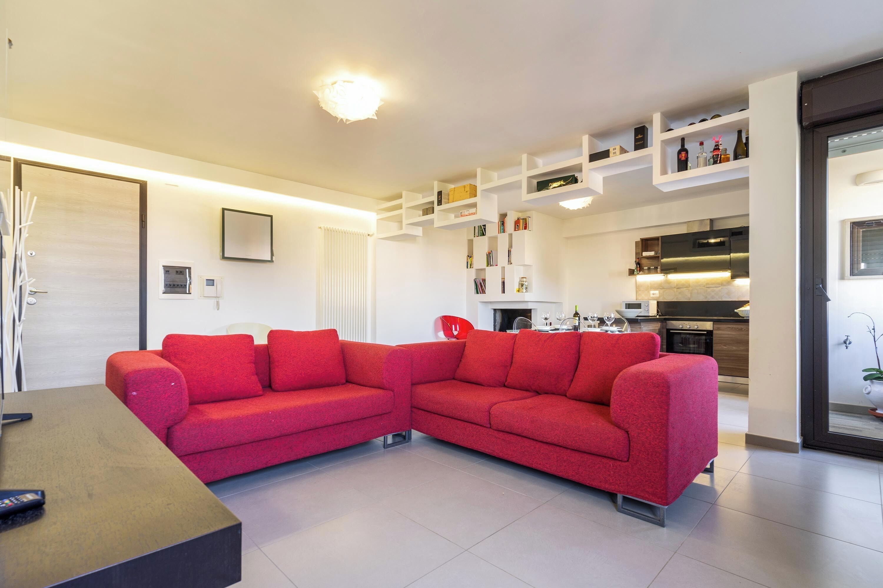 Basic Apartment | Living area | 1-cm flat-screen TV with digital channels