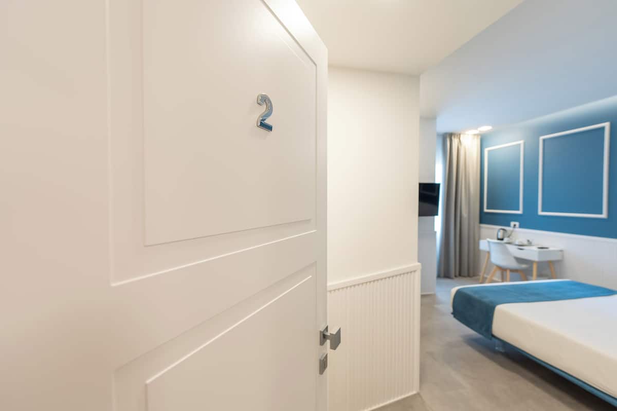 Deluxe Double Room, City View | In-room safe, blackout curtains, soundproofing, iron/ironing board