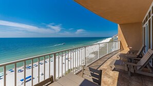 A balcony with a view of a beach and ocean. - Phoenix Orange Beach 804 3 Bedroom Condo (Orange Beach)