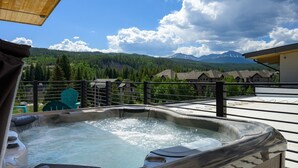 A hot tub on a balcony with a mountain view. - Aprez Retreat 3 Bedroom Condo by RedAwning (Winter Park)