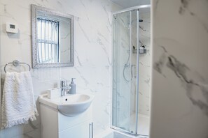 Hair dryer, towels, soap, toilet paper