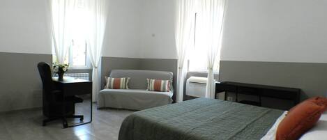 Departamento, vista a la ciudad | 2 habitaciones, tabla de planchar con plancha y wifi gratis