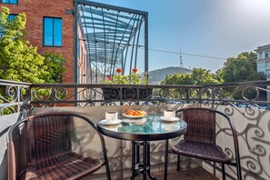 Habitación triple estándar | Terraza o patio