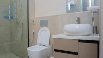 Shower, bidet, towels, soap