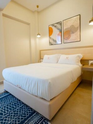 1 chambre, fer et planche Ă repasser, Wi-Fi, draps fournis