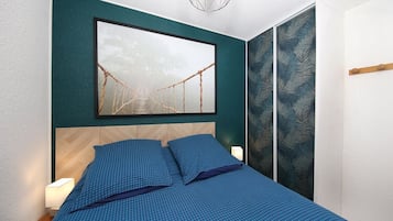 1 chambre, fer et planche Ă repasser, Wi-Fi gratuit, draps fournis