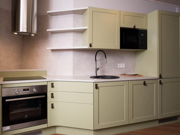 Bungalow | Cuisine privée | Chaise haute