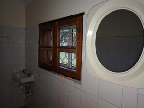 Shower, towels, soap, toilet paper