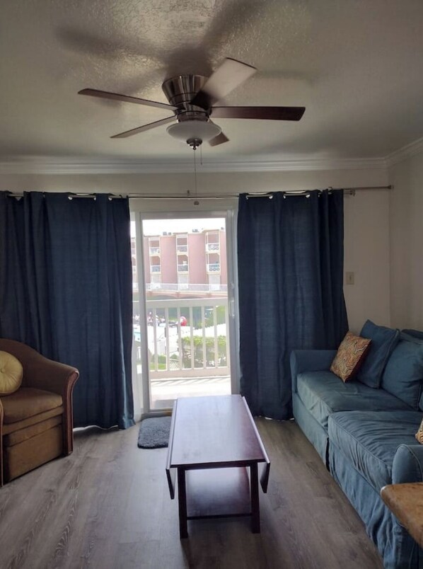 Living area - Island Beachwalk Waterfront! 2 Pools/Hot Tubs View (Galveston)