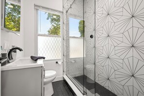 Hair dryer, towels, soap, shampoo