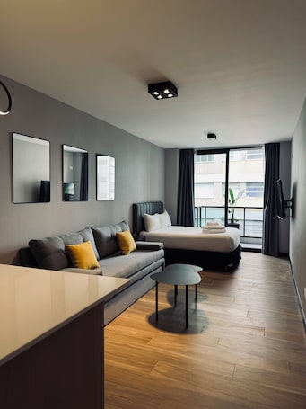 Roupas de cama premium, edredons de pluma, camas com colchões pillow-top. Live Belgrano Arcos Boutique Apartments
