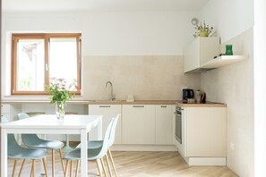 Comfort Apartment, 2 Bedrooms, Balcony, Mountain View | Private kitchen | Full-size fridge, oven, stovetop, dishwasher - Relais del Parco Verde e Relais del Parco Rosso (L'Aquila)