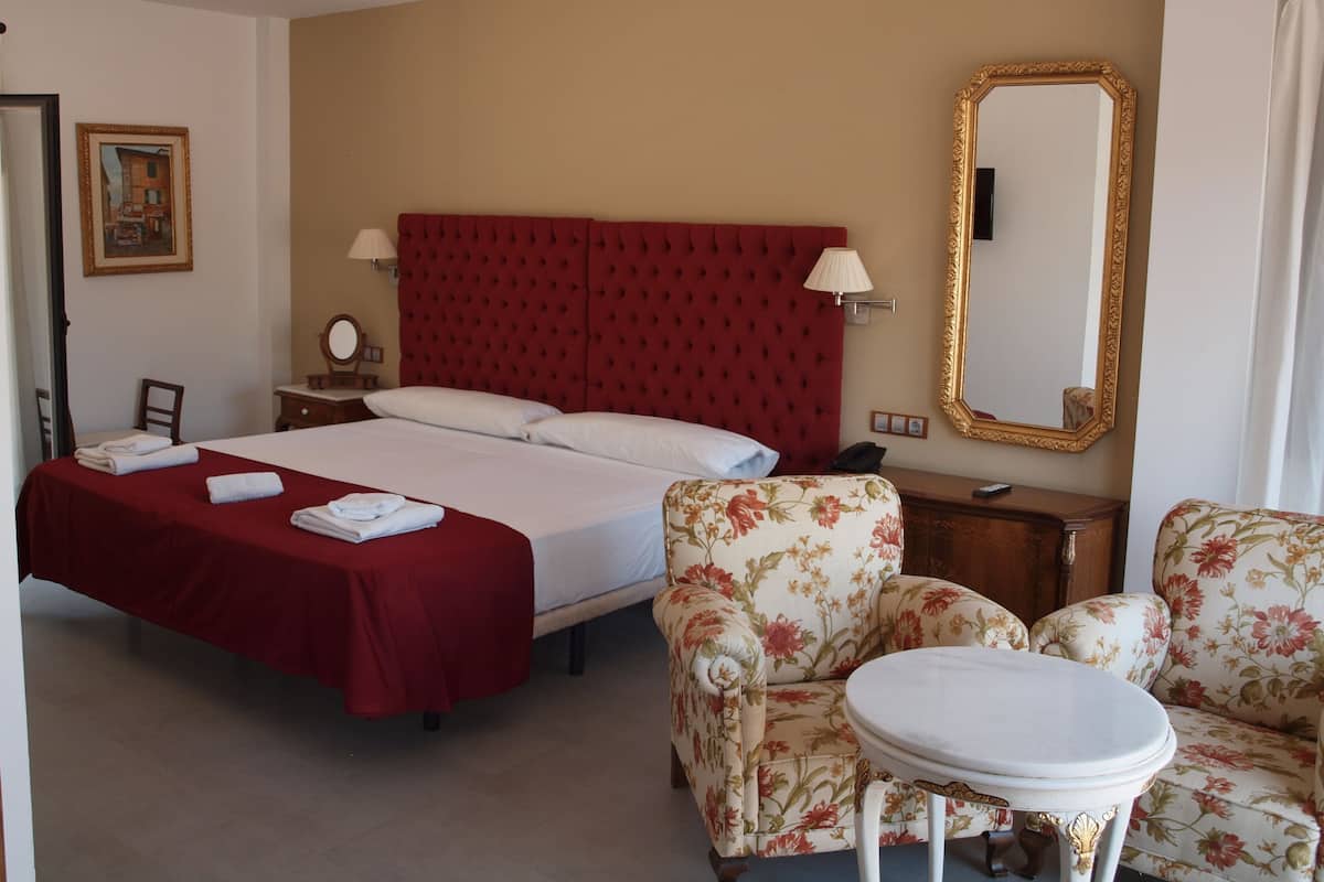 Desk, laptop workspace, free WiFi, bed sheets