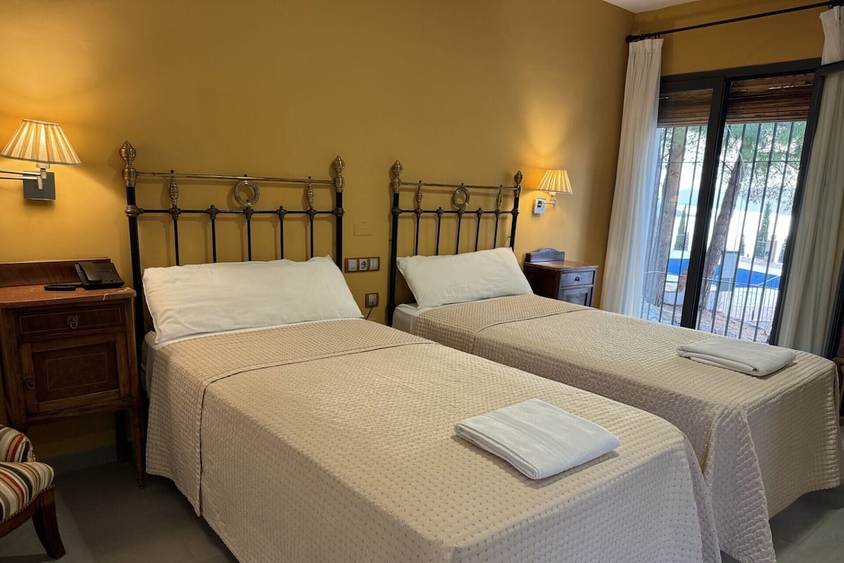 Desk, laptop workspace, free WiFi, bed sheets