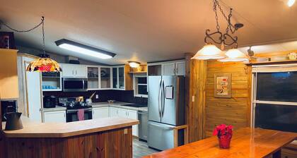 Shady House with River Access & Donkeys!
