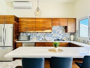 Fridge, dishwasher, coffee/tea maker, toaster
