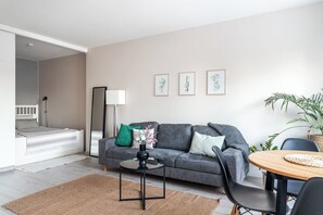 Superior Studio, City View | Living area | 55-inch Smart TV with cable channels - Bright & Cozy, Renovated Studio in the Center (Lahti)