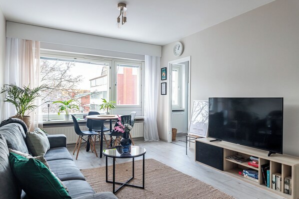 Superior Studio, City View | Living area | 55-inch Smart TV with cable channels - Bright & Cozy, Renovated Studio in the Center (Lahti)