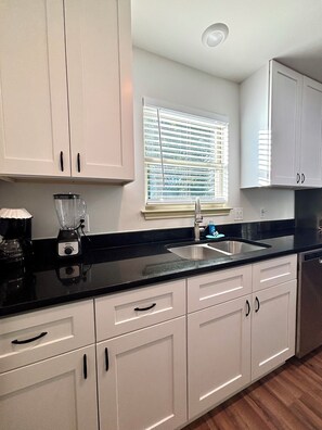 Fridge, microwave, oven, stovetop - Charming 3-Bedroom,1-Bath Cozy Getaway with Modern Comforts and a Welcoming Vibe (Austin)