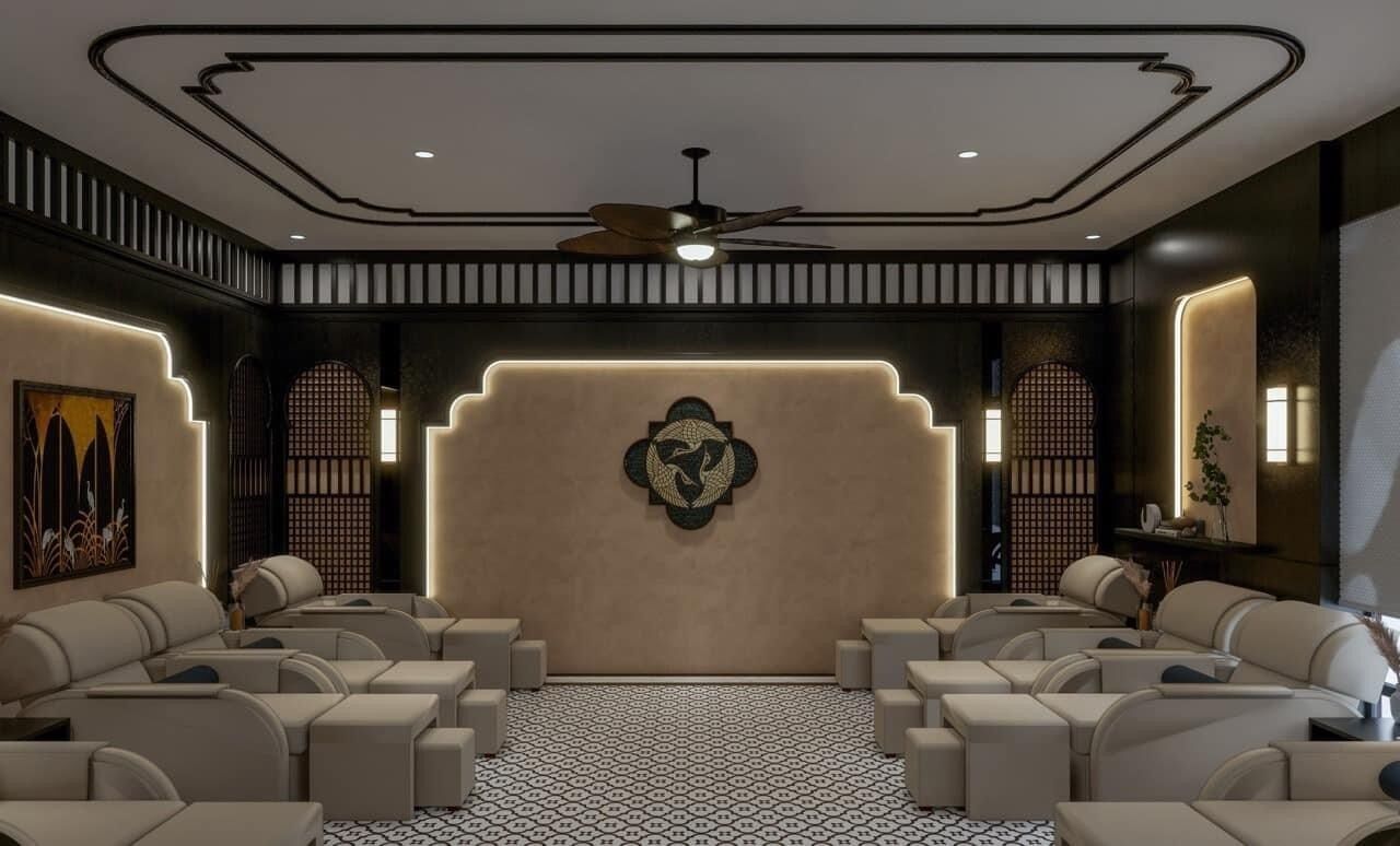 Eine moderne Lounge mit einem zentral angebrachten Emblem, eingelassener Deckenbeleuchtung und einem gemusterten Boden.