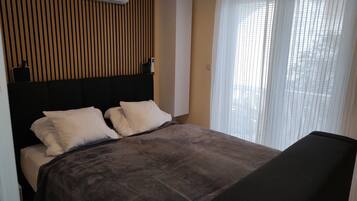 1 chambre, fer et planche Ă repasser, Wi-Fi, draps fournis