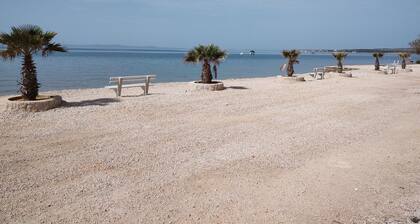 Apartment directly by the sea first row island Vir south near Zadar 2 adults + child