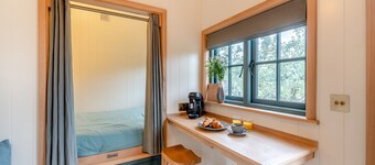 Set among the fruit trees with views of the fields.
