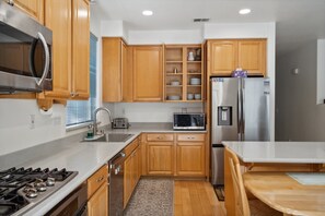 Fridge, microwave, oven, coffee/tea maker - Sunny Serenity: Pet Friendly 5BR Home In San Jose by RedAwning (San Jose)