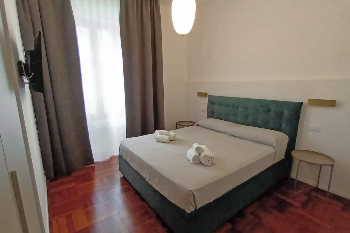 Classic Double Room | Premium bedding, laptop workspace, blackout drapes, cribs/infant beds