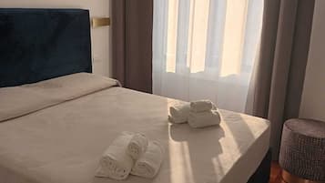 Standard Double Room | Premium bedding, laptop workspace, blackout curtains, cots/infant beds