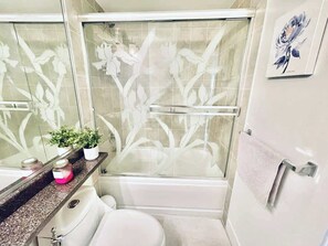 Shower, hair dryer, shampoo