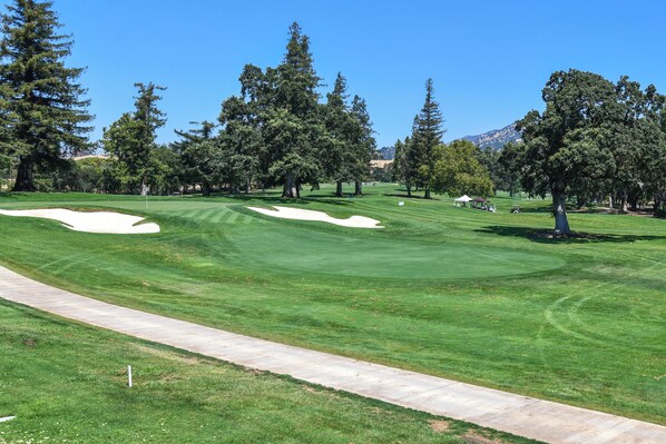 A golf course with sand bunkers, a walking path, and trees. - Napa Golf Course Condo - 2 King Suites + En-Suite Baths - Perfect for 2 couples (Napa)