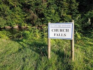 A sign for Glanusk Estate Church Falls.