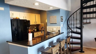 Spacious 4-bedroom condo with space for your boat or to relax on Lake Conroe.