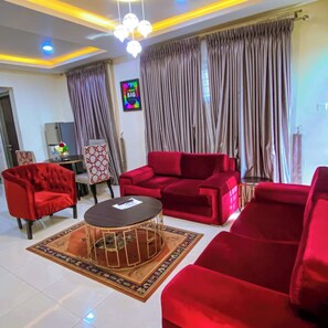 Family Room, Balcony, City View | Living area | TV - Ziroc Apartments Lekki (Lekki)