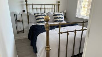 2 bedrooms, iron/ironing board, travel crib, bed sheets