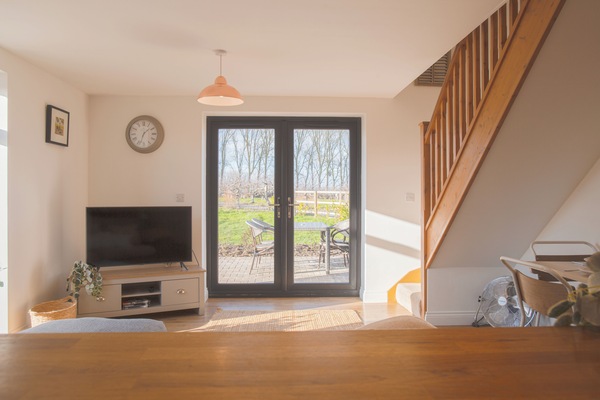 House, Garden View | Living area | Flat-screen TV