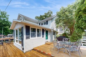 Outdoor dining - Lakefront home with large deck, dock, kayak, & gorgeous views (Hector)