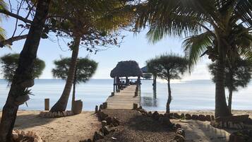 On the beach, sun loungers
