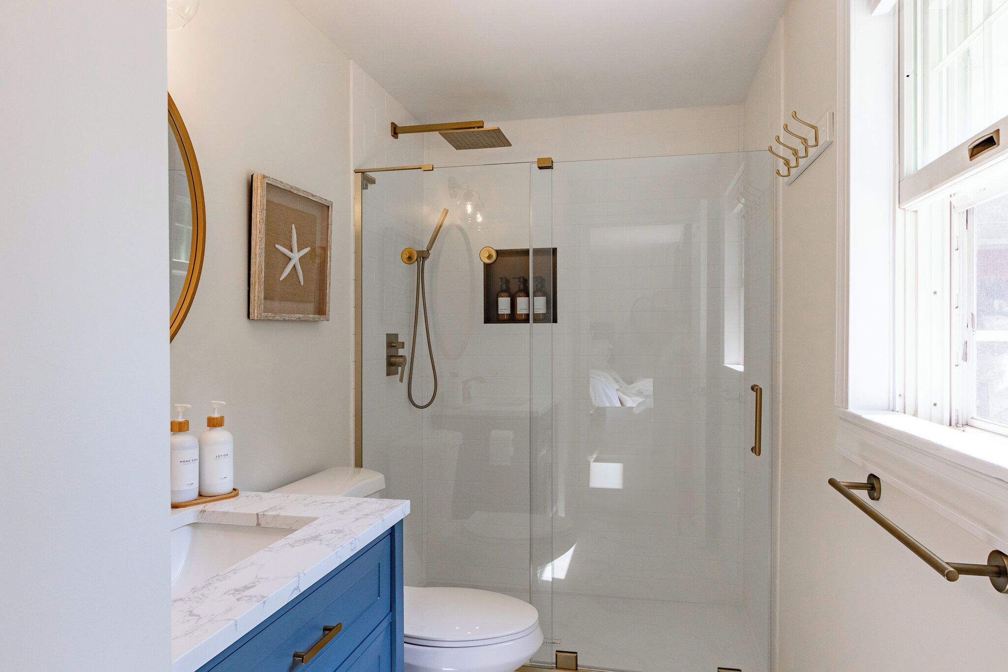 Shower, hair dryer, towels, soap