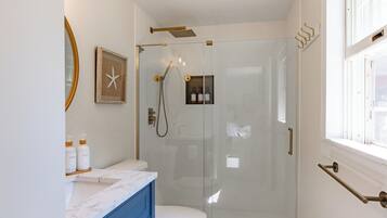 Shower, hair dryer, towels, soap