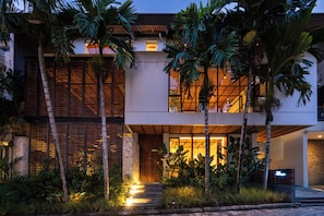 Luxury Villa, 5 Bedrooms, Kitchen, Garden View | Front of property – evening/night - The Hollow Villa by Betterplace (Canggu)