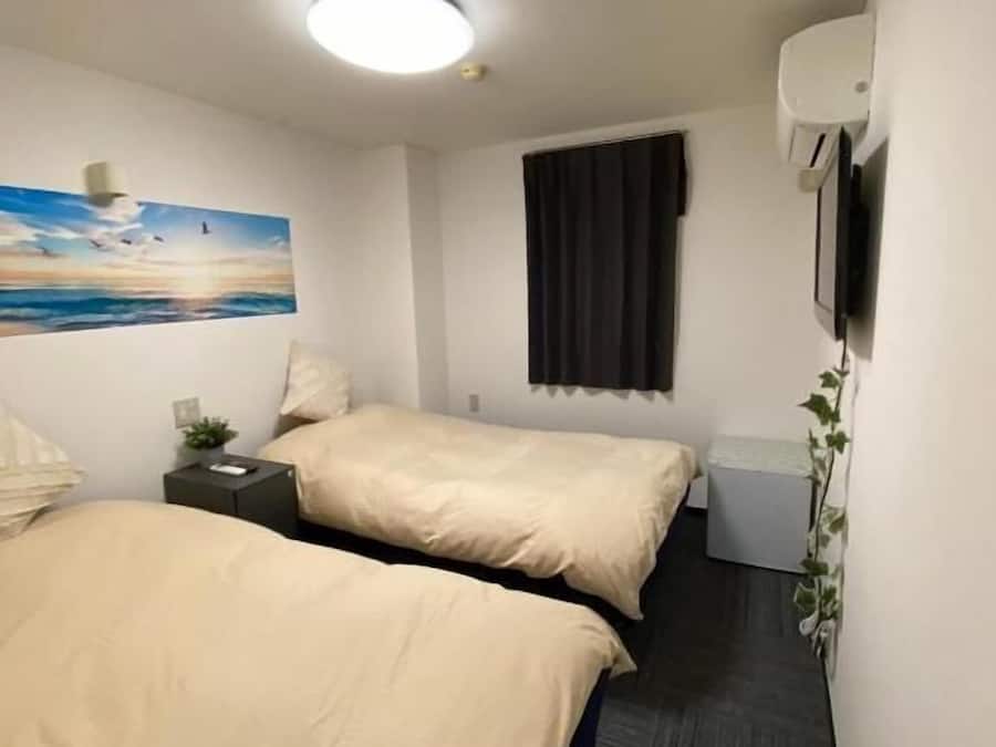 Chambre Standard avec lits jumeaux, vue partielle sur le lac