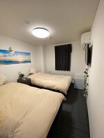 Standard Twin Room, Partial Lake View | Individually decorated, free WiFi, bed sheets