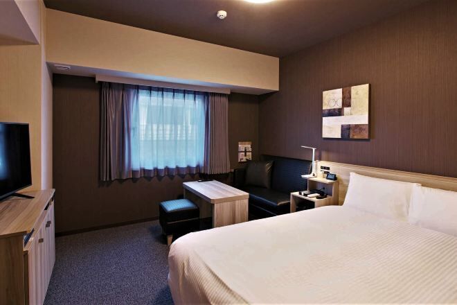 Desk, laptop workspace, blackout drapes, iron/ironing board